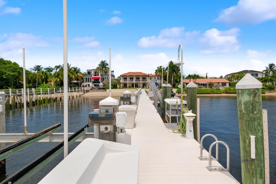 This stately 5 bedroom 5.5 bath's .334 acres is tucked away on one of the quietest cul de sac's of the sought after Hypoluxo Island and offering 96.7 Ft. of direct intracoastal waterfrontage.  The spectacular and direct water views can be enjoyed thought-out about 80%+ of the house.Concrete Pile And Heat Resistant Composite Decking Dock consists of 3 Lifts Of 30,000 Lb, 14,000 Lb, And A Two-Jet-Ski Lift, Electricity & Water.
