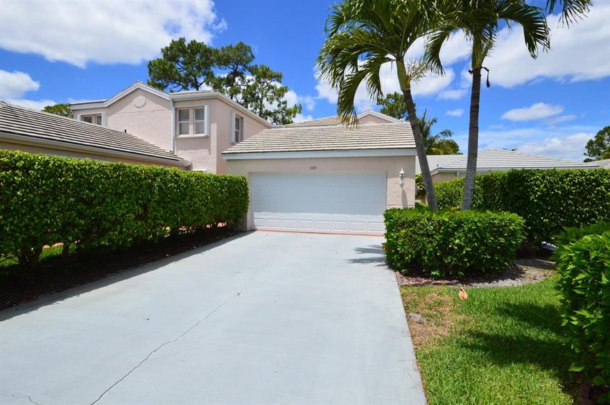 Great 3 bedrooms and den, Feels like single family, located on canal/lake, gated resort style community, 2 story,  Master Bedroom downstairs, granite counters and backs-plush, wooden cabinets, wooden floors, freshly painted,  new carpeting downstairs in Master bedroom, new garage door and 2 years old A/C unit.