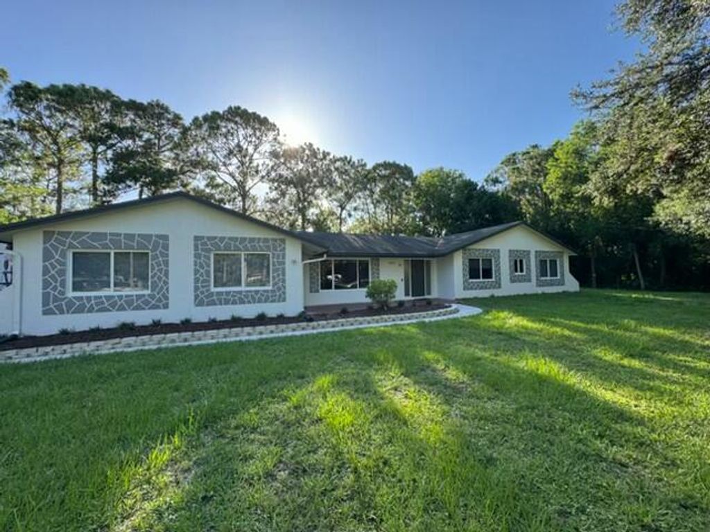 Photo of 4901 N 129th Ave Avenue N, The Acreage, FL 33411 (MLS # B26017632)