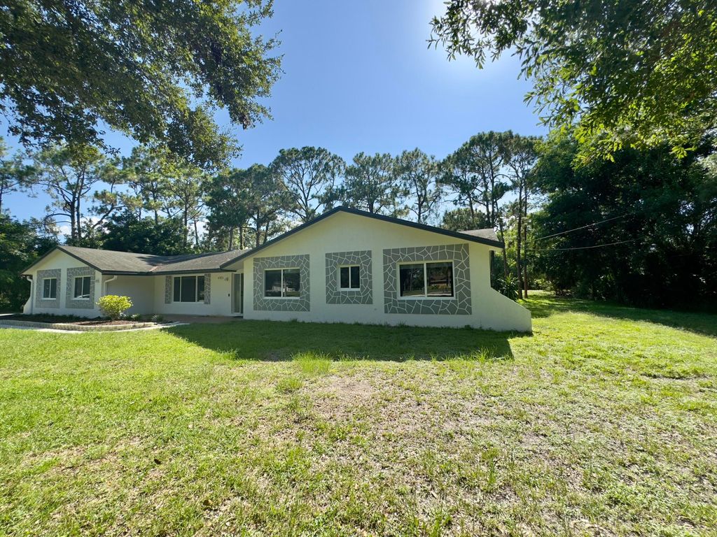 Photo of 4901 N 129th Ave Avenue N, The Acreage, FL 33411 (MLS # B26017632)