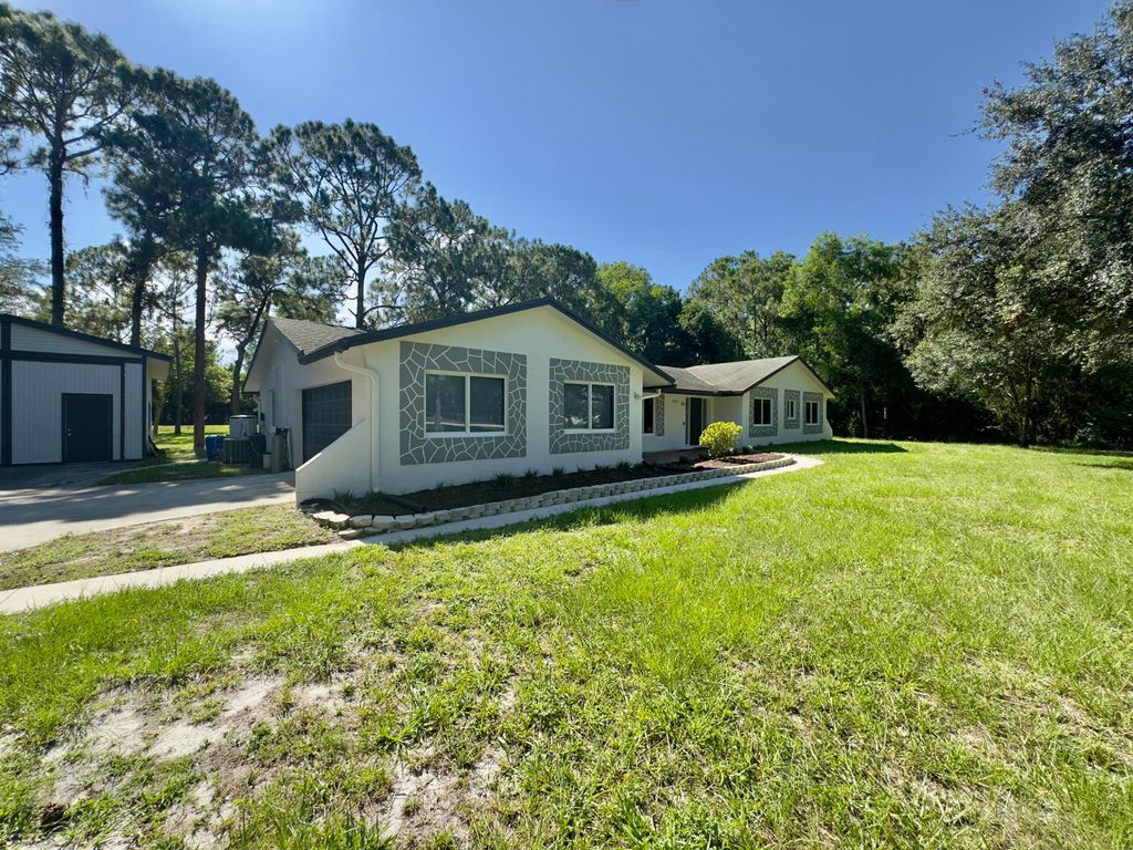 Photo of 4901 N 129th Ave Avenue N, The Acreage, FL 33411 (MLS # B26017632)
