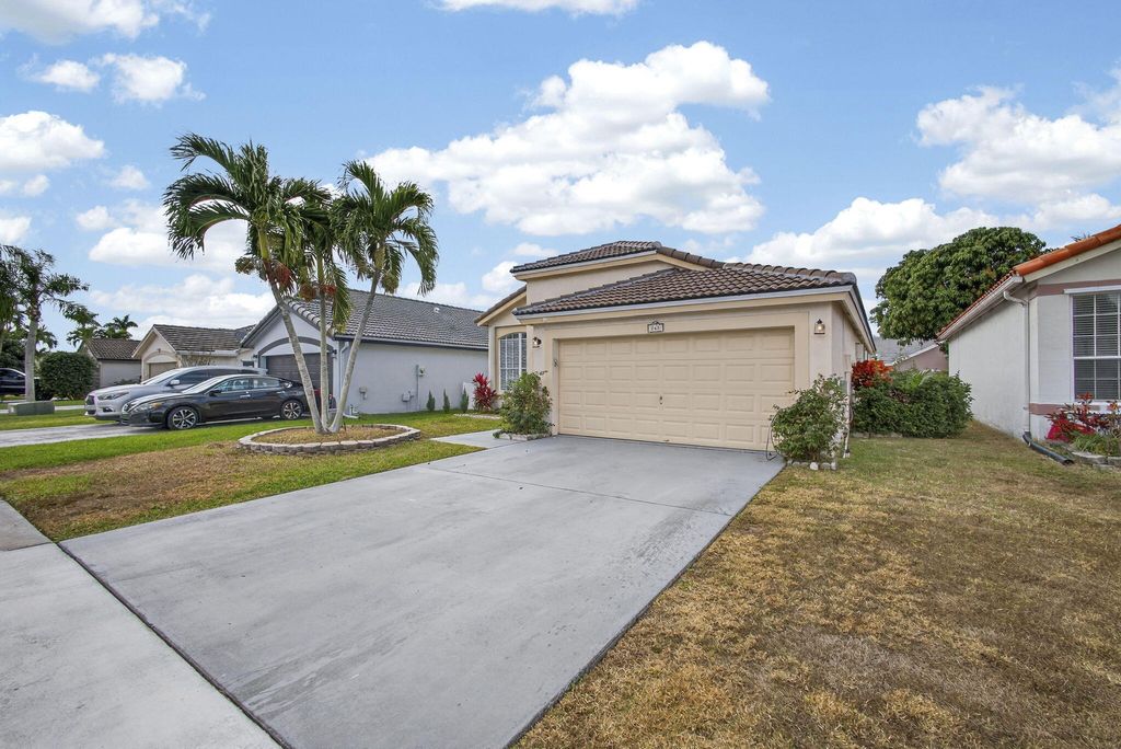 Photo of 765 Lake Wellington Drive, Wellington, FL 33414 (MLS # R11160531)