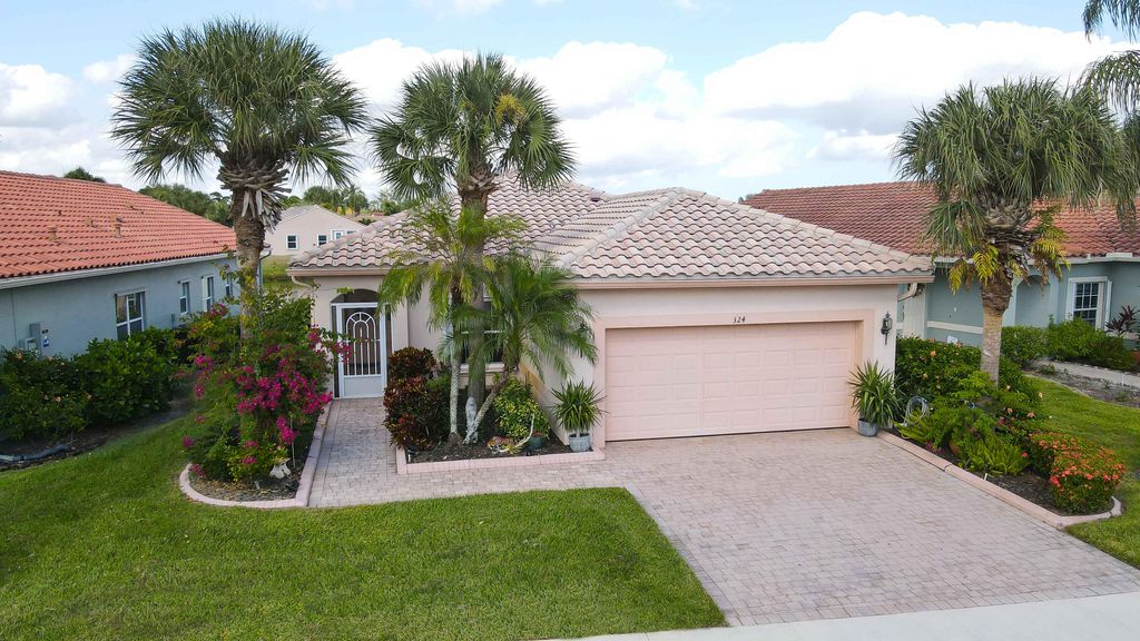 Photo of 324 NW Breezy Point Loop, Port Saint Lucie, FL 34986 (MLS # R11142048)