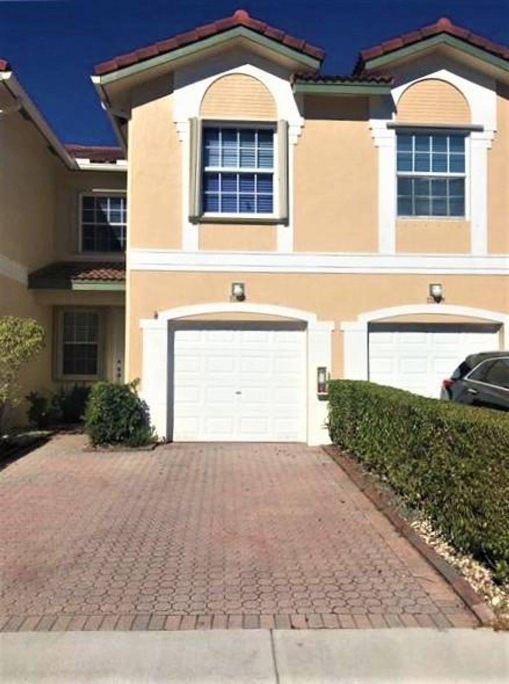 Photo of 11633 NW 47th Dr, Coral Springs, FL 33076 (MLS # F10383061)