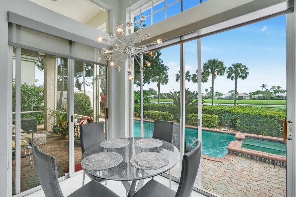 Photo of 151 Coral Cay Drive, Palm Beach Gardens, FL 33418 (MLS # R10959047)