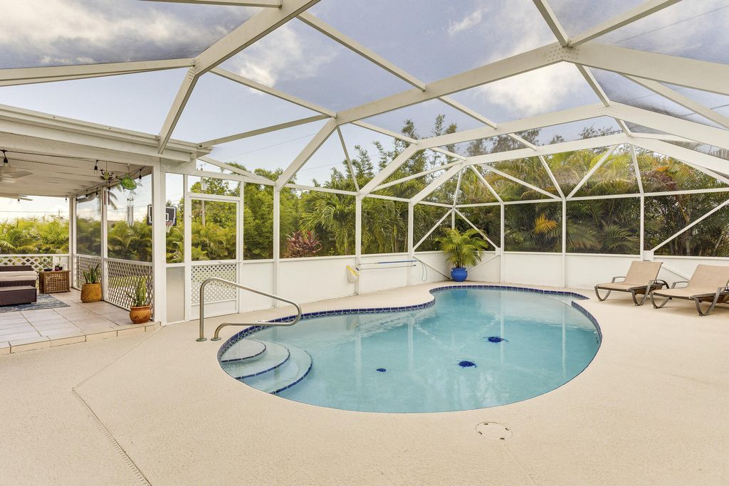 Photo of 1025 SW Canary Terrace, Port Saint Lucie, FL 34953 (MLS # R10944782)
