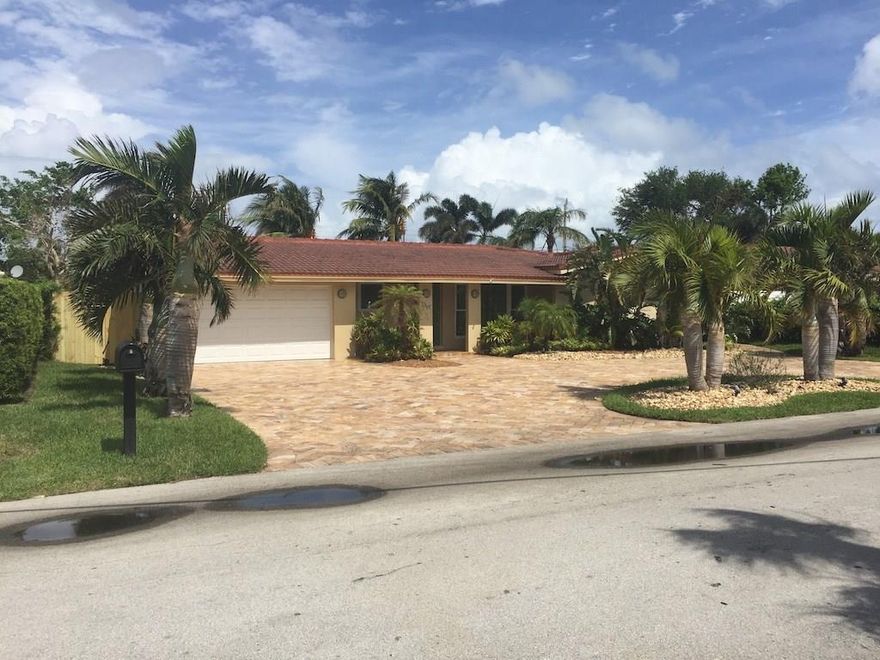 A Lauderdale by the Sea Gated Community home with impact windows, polished marble floors, recent painted, new lawn,as well as updated kitchen and marble baths. A short stroll allows for Town Beach access as well as Sea Ranch Shopping Center (Publix, CVS, shops & restaurants) in addition to Downtown Lauderdale by the Sea pier, shops & restaurants. A free "Pelican Hopper" air-conditioned Shuttle is also available.