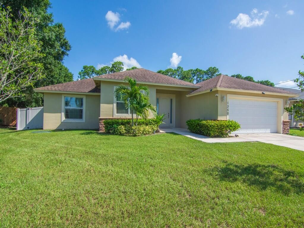 Photo of 1350 SW Hunnicut Avenue, Port Saint Lucie, FL 34953 (MLS # R11007615)