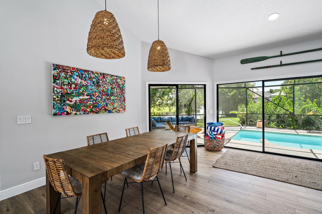 Photo of 10611 SE Jupiter Narrows Drive, Hobe Sound, FL 33455 (MLS # R10867812)