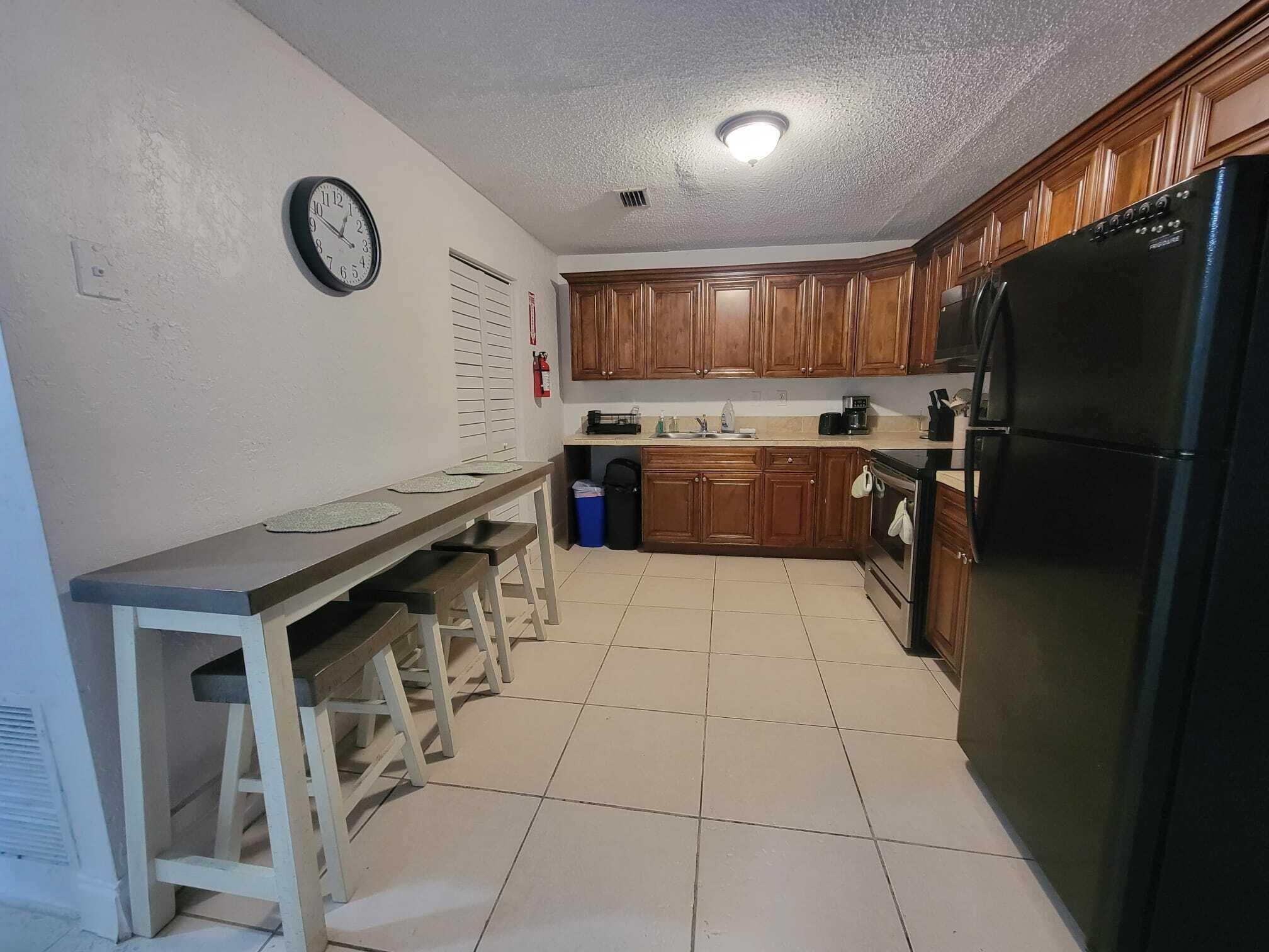 Discover your new home in the heart of Lauderhill! This well-maintained and spacious residence has everything you need for comfortable living. Features: 3 spacious bedrooms, 2 full bathrooms. The kitchen is equipped with refrigerator stove, and microwave. Washer and dryer included for your convenience. Plenty of space for everyday living. Unfurnished (furnishing negotiable). Available for immediate move-in!