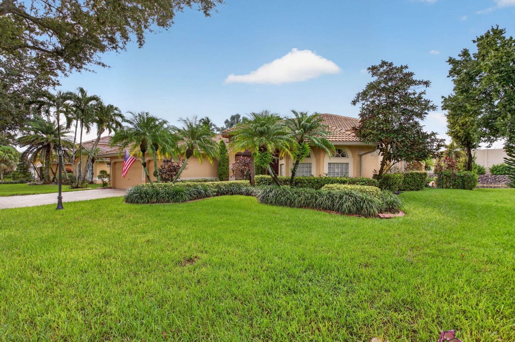 Photo of 10002 NW 58th Court NW, Parkland, FL 33076 (MLS # B26079632)