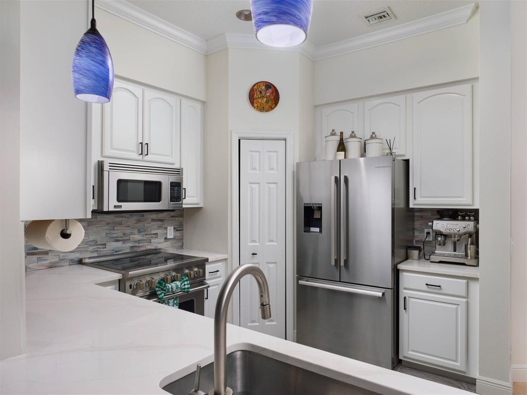 Photo of 284 Clocktower Drive, Jupiter, FL 33458 (MLS # R11148986)