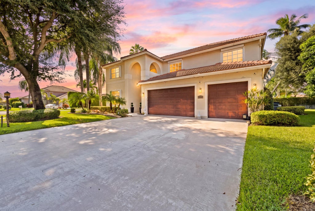Photo of 7202 CATALINA ISLE Drive, Lake Worth, FL 33467 (MLS # B26077121)