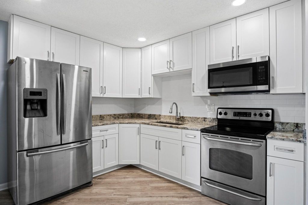 Photo of 2069 NE Collins Circle #7110, Jensen Beach, FL 34957 (MLS # R10902434)