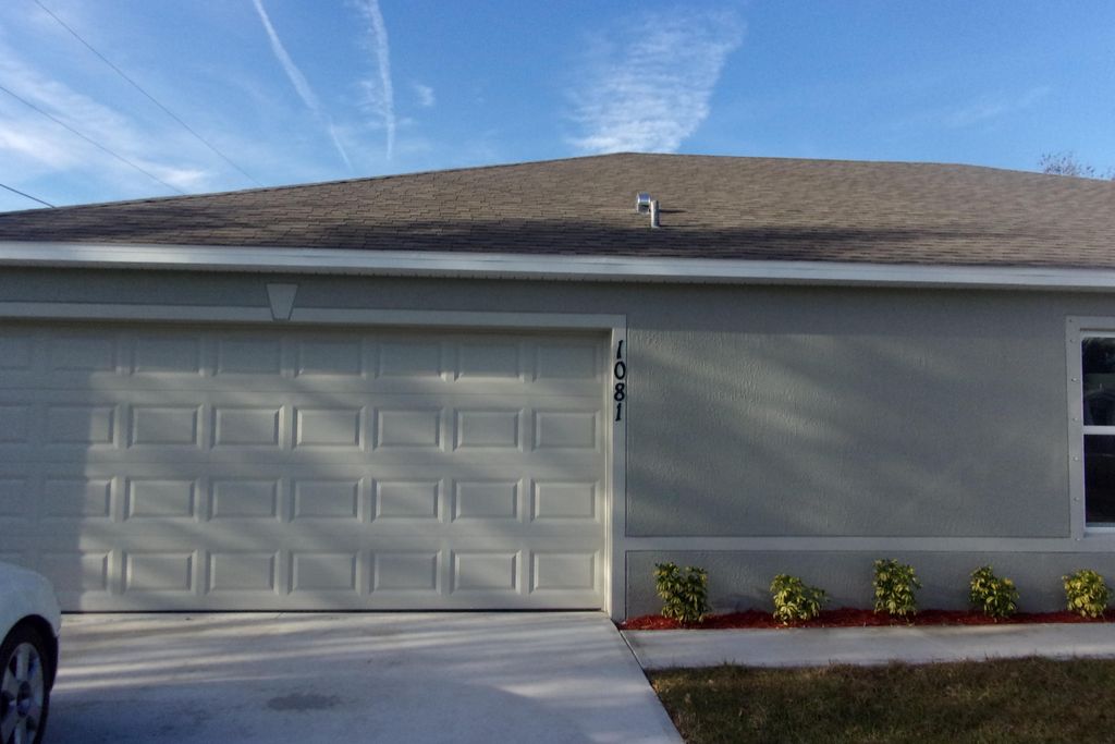 Photo of 1081 SW Spataro Avenue, Port Saint Lucie, FL 34953 (MLS # R10979797)