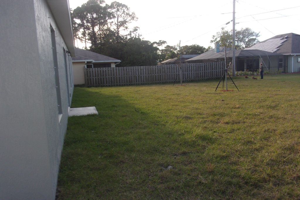 Photo of 1081 SW Spataro Avenue, Port Saint Lucie, FL 34953 (MLS # R10979797)