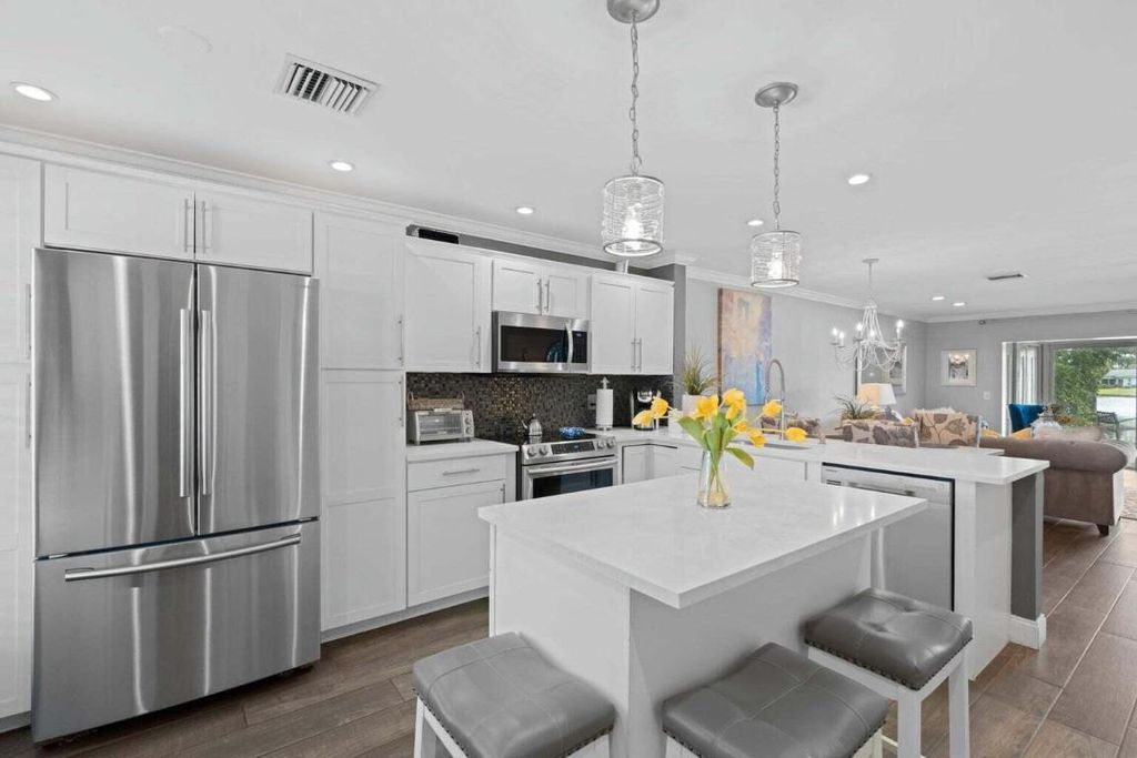 Photo of 5400 Poppy Place #B, Delray Beach, FL 33484 (MLS # R11156344)