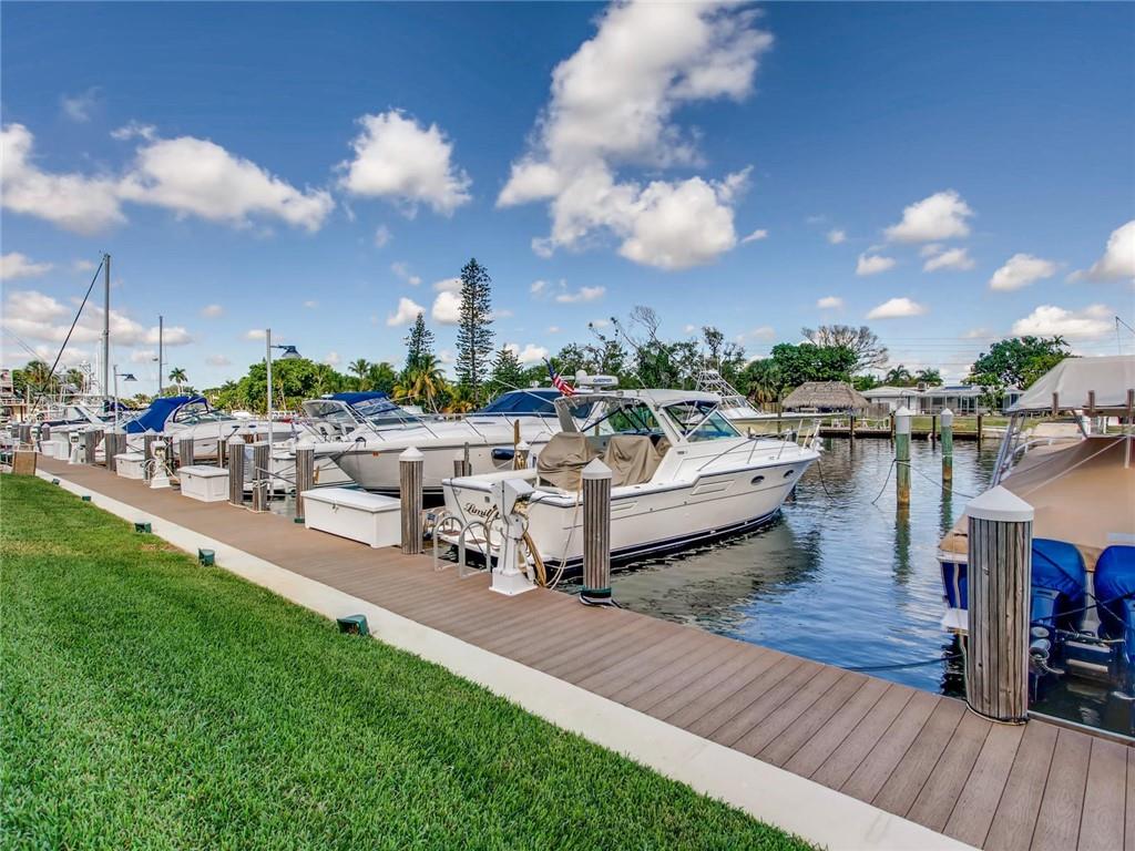 Clean And Well Maintained Condo Is Your Blank Canvas. This Unit Is Ideally Situated Along The Curve Of The Building, Giving You A Wider Living Room Than Other Units In The Building. Dock And Boat Slip When Available In Condo's Own Yacht Club. No Fixed Bridges. Clubhouse With Many Amenities Including Party Room, Service Kitchen, Lending Library, Gym, Bb Areas, Shuffleboard, Pool. Active And Friendly Community, 55+. No Pets. Motivated Seller Has Paid All Assessments. Ready For You To Make It Entirely Your Own, With Your Own Personal Style.
