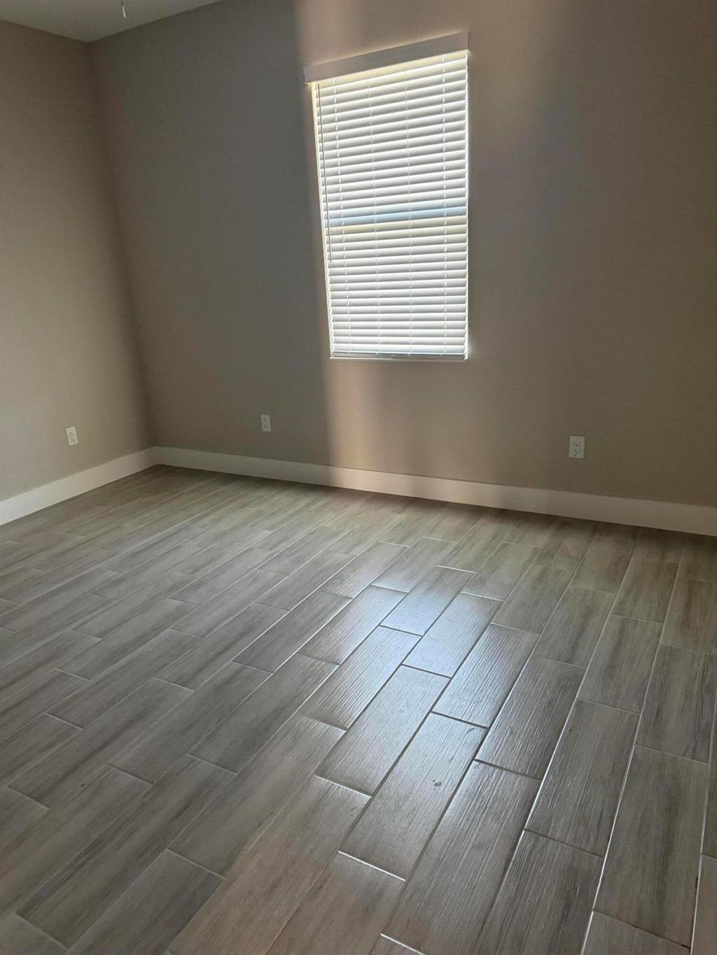 Photo of 4043 SW Mcintosh Street, Port Saint Lucie, FL 34953 (MLS # R11117585)