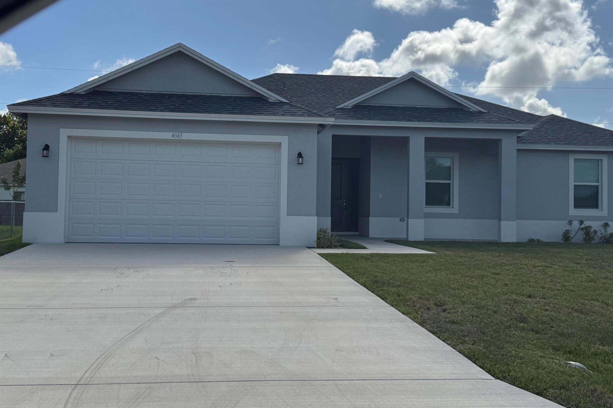Beautiful 4-bedroom, 2.5 bathroom. Tile throughout home. Kitchen island with granite countertops. Master has separate shower with freestanding oval bathtub.