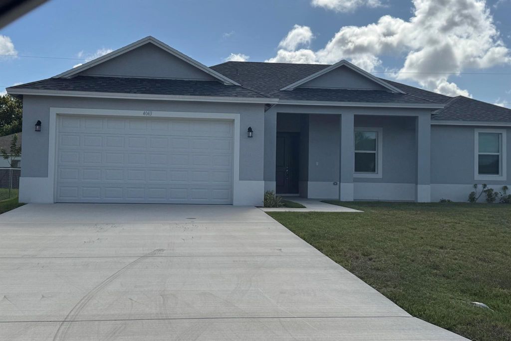 Photo of 4043 SW Mcintosh Street, Port Saint Lucie, FL 34953 (MLS # R11117585)