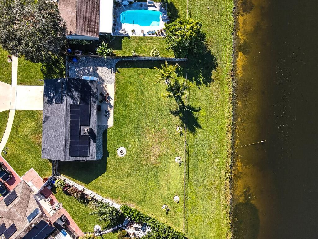 Photo of 122 Parkwood Drive, Royal Palm Beach, FL 33411 (MLS # R11152488)