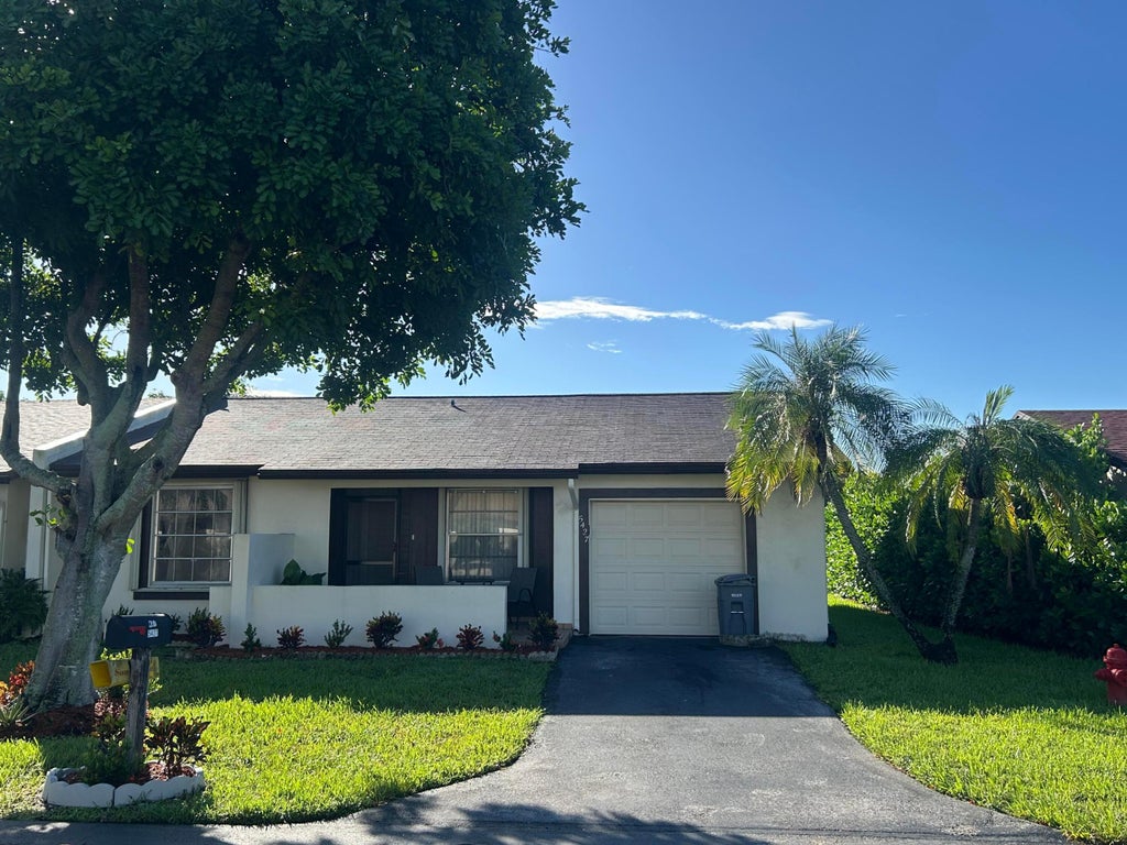 Photo of 5427 LAUREL OAK Street, Delray Beach, FL 33484 (MLS # B26077809)