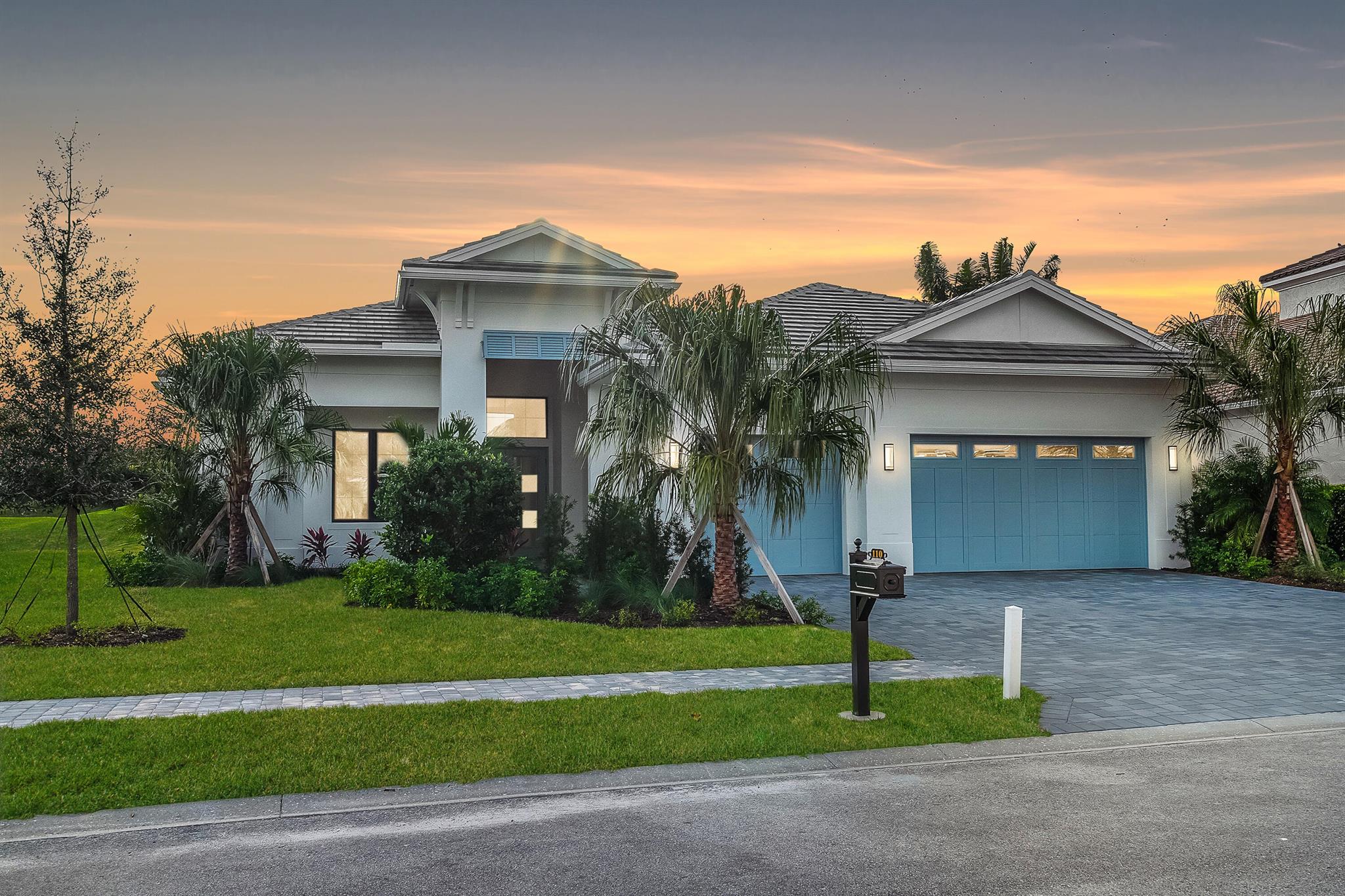 This Coastal Modern offering from GHO Homes with fantastic amenities is now available. Expansive twelve ft. high ceiling with oversized storm guard windows & doors announce you have arrived. Family room, kitchen, dining, club room, covered patio and pool create a one of kind living experience. The kitchen features Cafe series appliances, natural gas cooktop, 42'' double door frig., build in convection wall oven, quartz counter tops, stacked upper cabinets with glass accent doors. The primary suite features a morning bar, a Carrie Bradshaw style display closet with custom shelfs, a 2nd walk-in, 12 ft high tray ceiling & is privately located on its own wing. Primary bath has double vanities, soaking tub & premium shower. Two Guest suites each have private baths & Walk-in closets.