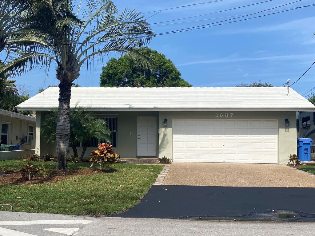 Photo of 1637 NE 34th Lane, Oakland Park, FL 33334 (MLS # F10427142)