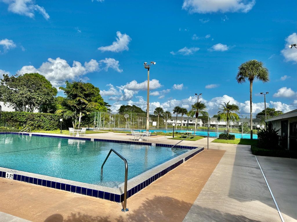 Photo of 5704 Channel Drive, Greenacres, FL 33463 (MLS # R10931395)