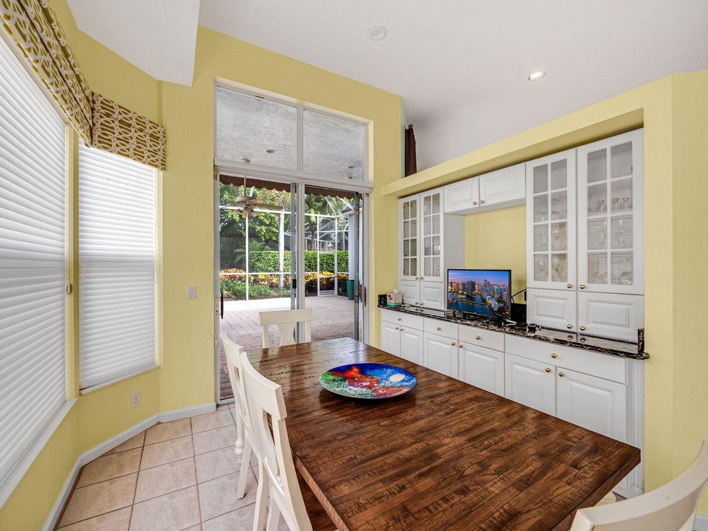 Photo of 320 Sunset Bay Lane, Palm Beach Gardens, FL 33418 (MLS # R11010223)