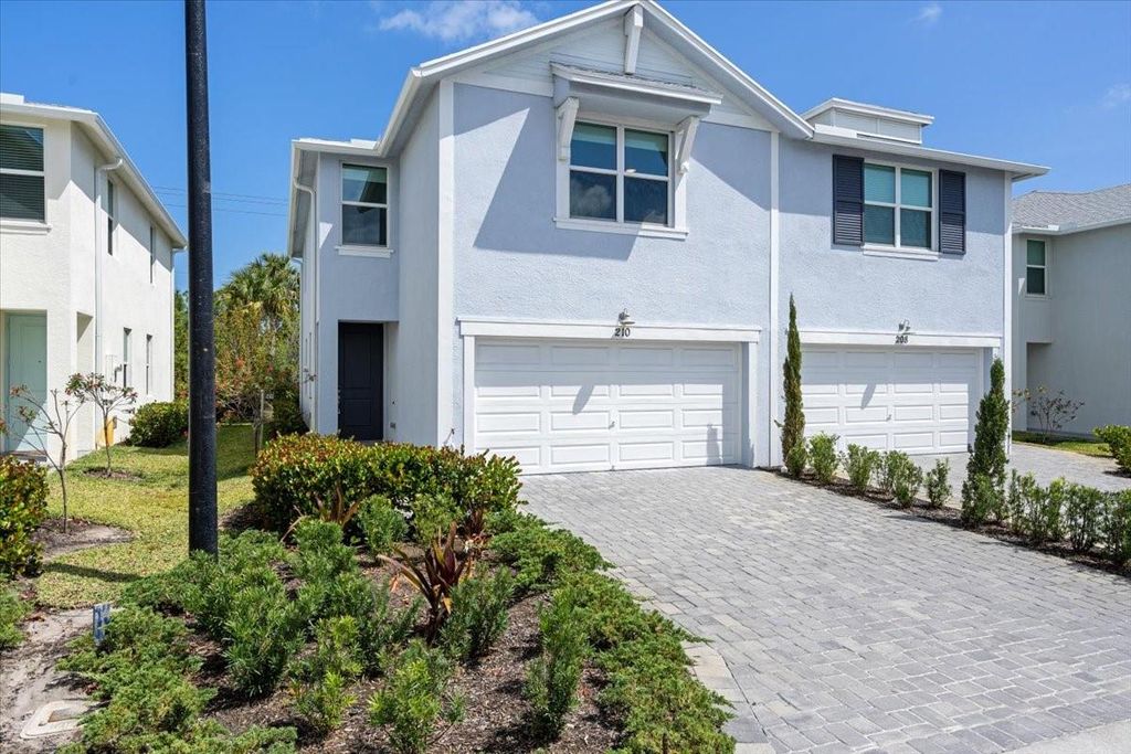 Photo of 210 Osprey Preserve Blvd, Jensen Beach, FL 34957 (MLS # F10506027)