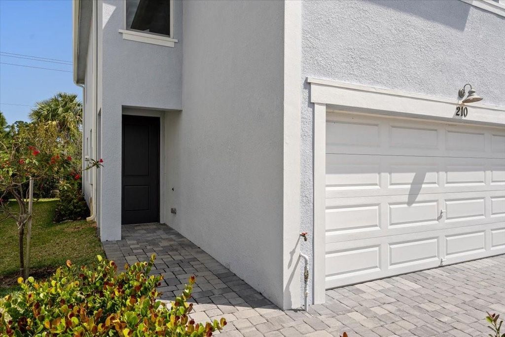 Photo of 210 Osprey Preserve Blvd, Jensen Beach, FL 34957 (MLS # F10506027)