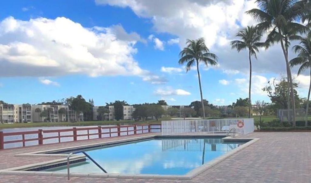 Photo of 9411 Evergreen Place #302, Davie, FL 33324 (MLS # B26018350)