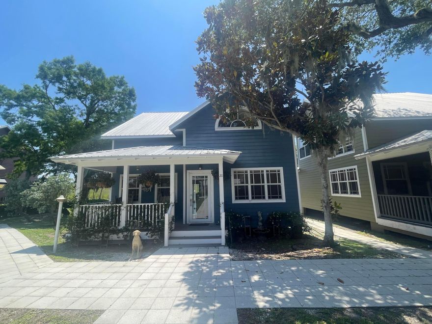 Charming Waterfront Cottage on the Rim Canal — Lake Okeechobee Access  $2,400/Month | Water & Trash Included | Property Management Included  This beautifully renovated 2-bedroom, 2-bath cottage sits along the rim canal of Lake Okeechobee with direct lake access. Fully remodeled in 2022, the updated kitchen features marble countertops and stainless steel appliances. Stunning French doors frame panoramic water views and gorgeous sunsets. The loft area offers flexibility as a third bedroom or home office.  Your private boat dock is included with rent. A durable metal roof, water, trash, and professional property management are all included. Conveniently located with easy access to Florida's East Coast.  Waterfront living at its finest — don't miss it.