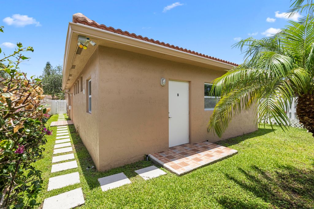 Photo of 907 Stanton Drive, Weston, FL 33326 (MLS # B26031566)