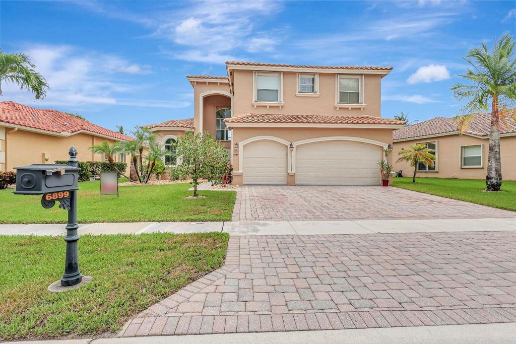 Photo of 6899 Houlton Circle, Lake Worth, FL 33467 (MLS # R10995607)