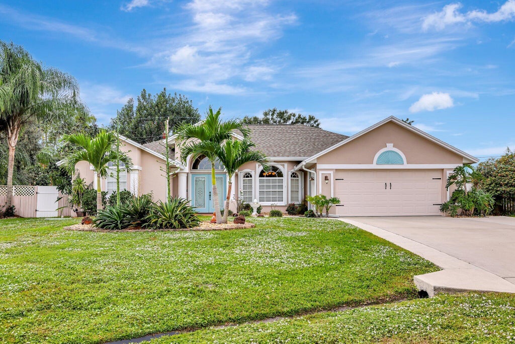 Photo of 1974 SW Oakwood Road, Port Saint Lucie, FL 34953 (MLS # R11038370)