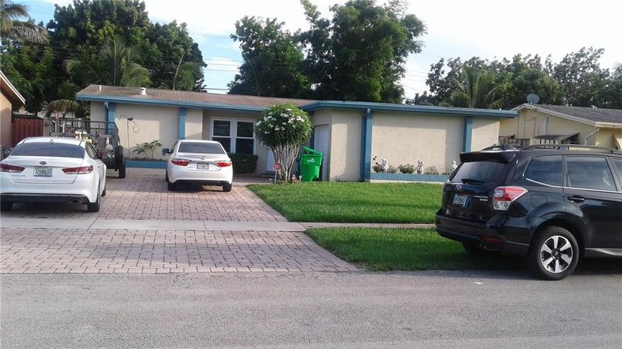 $50K in Upgrades! NewExt Paint & Stucco! Remodel frm floor up! Split b/r features Wood & Granite Kitchen,New High Hats,convect oven.living areas Tiled w/Wood Lk, Real Wood Flr in Mstr, Pergo 2nd Br, Stone tile bthrms,wood vanities,Jet Spa main bath! $23K spent on Dbl Pane Impact Windows & Doors!Lot of clost space &Attic! Bahama Shutters,Reinforced Grg Dr! Pavered huge driveway! Bring Boat!Fits 6 Cars!Huge, Prvt & Park like,Fence Yd,Tropical-2 Patios w/Pavrs,Fountain,Prof instll Aux Elec! 2 much 2 mention!