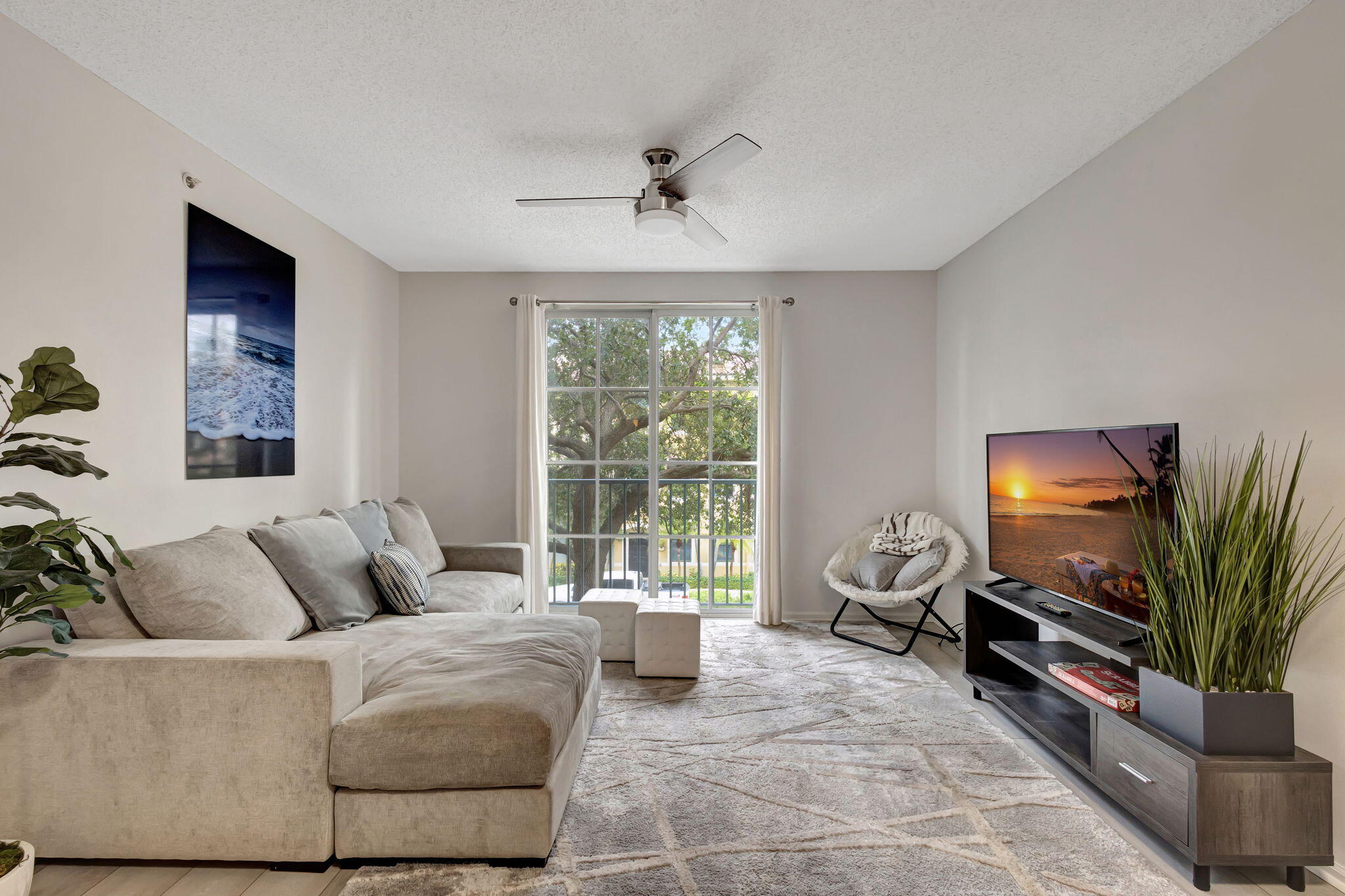 Enjoy living at its best in CityPlace, Downtown West Palm Beach!This 756 sq ft unit features vinyl wood plank flooring throughout, upgraded countertops and cabinets, stainless steel appliances, and updated lighting. All appliances, including the in-unit washer and dryer, are 3 years old or newer.Conveniently located near the elevator and includes parking space #296--on the same floor and close to the unit.Walk to everything CityPlace has to offer:360 Rosemary, Brightline, Publix, the Kravis Center, Convention Center, Tri-Rail, restaurants, bars, and more.Tenants will have access to the Courtyards' resort-style amenities, including a fitness center, pool, spa area, and business center with free printing.Refundable HOA fee
