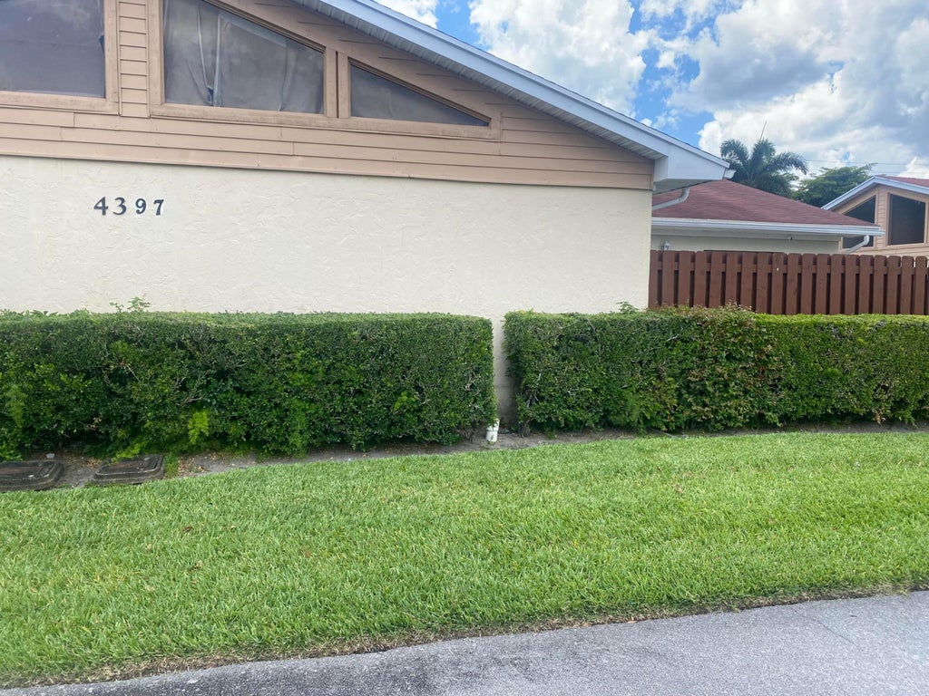 Photo of 4397 Woodstock Drive #A, West Palm Beach, FL 33409 (MLS # B26046216)