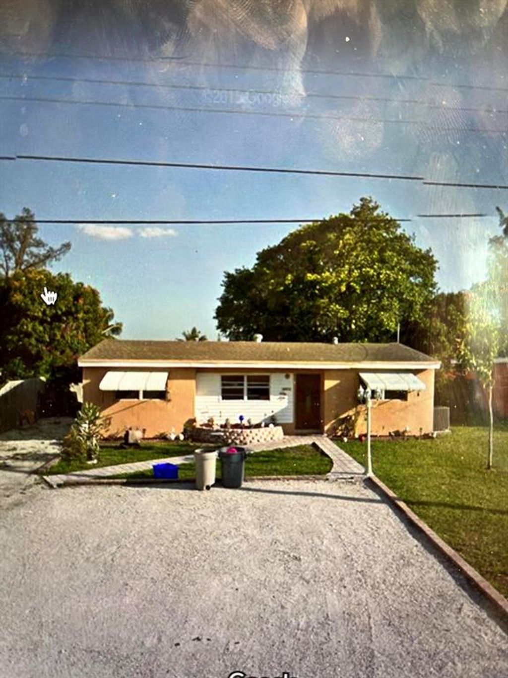 Photo of 436 Waseca Drive Dr, Lake Worth Beach, FL 33462 (MLS # R10763708)