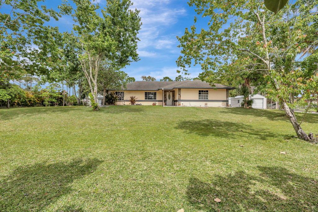 Photo of 13375 74th Street N, The Acreage, FL 33412 (MLS # R10973640)