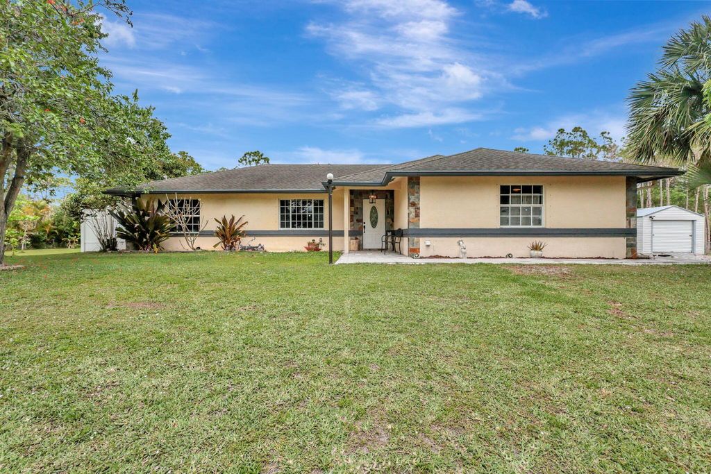 Photo of 13375 74th Street N, The Acreage, FL 33412 (MLS # R10973640)