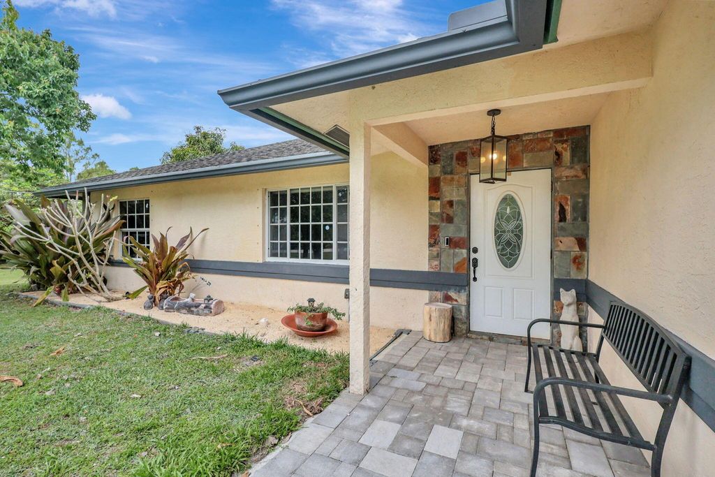 Photo of 13375 74th Street N, The Acreage, FL 33412 (MLS # R10973640)