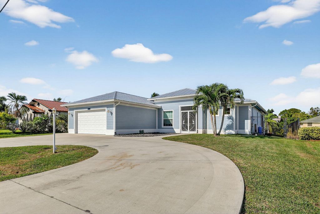 Photo of 213 NE Sagamore Terrace, Port Saint Lucie, FL 34983 (MLS # R11145802)