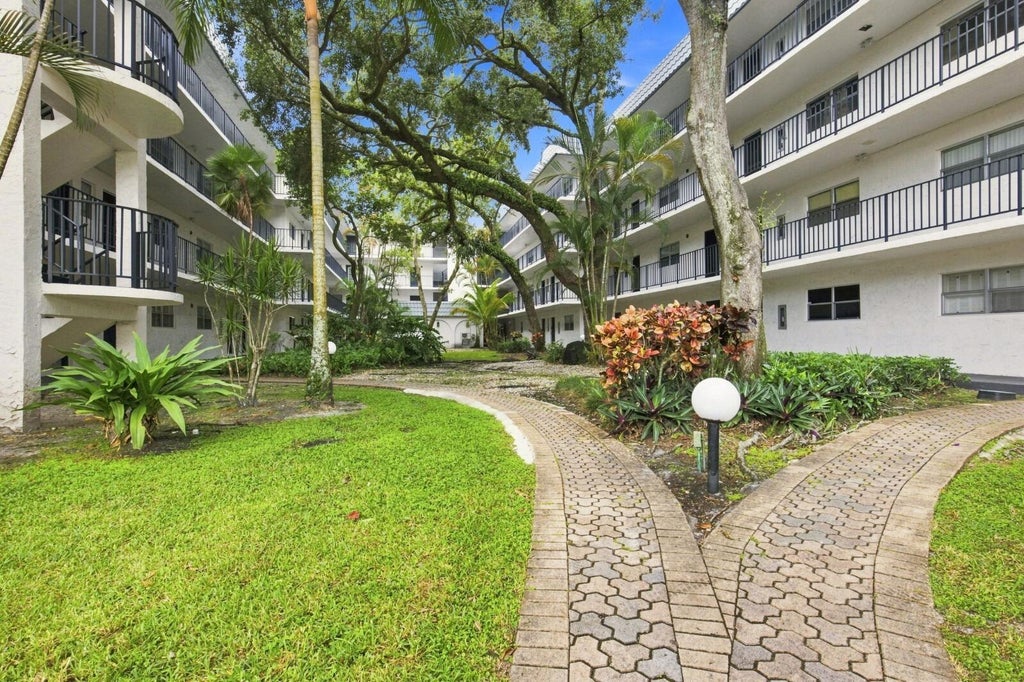 Photo of 3280 SPANISH MOSS Terrace #403, Lauderhill, FL 33319 (MLS # B26070329)