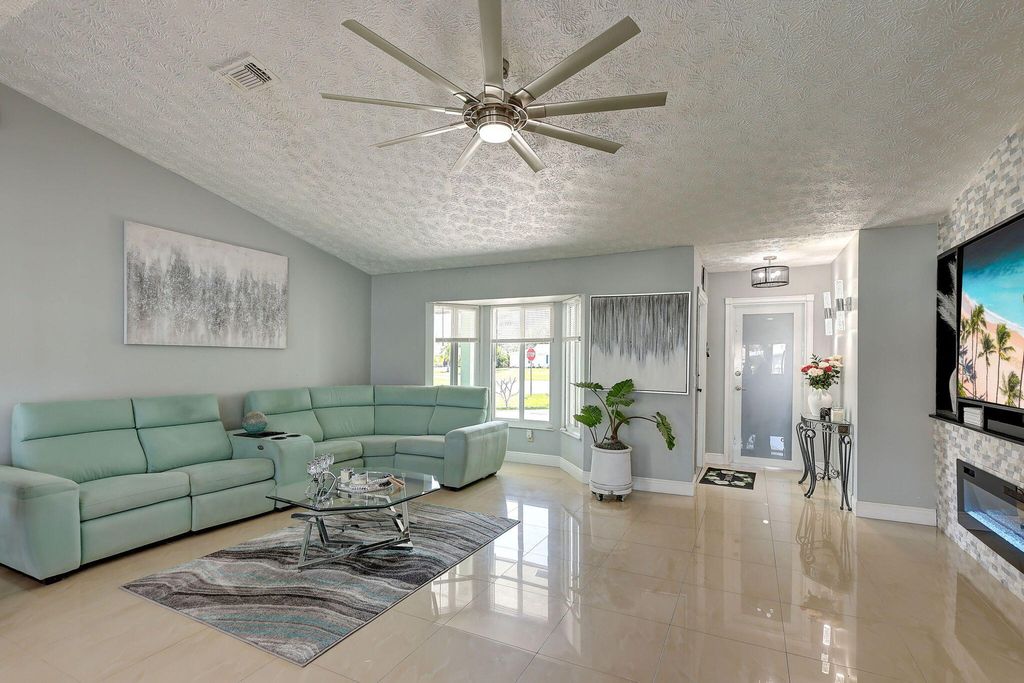 Photo of 779 SE Carnival Avenue, Port Saint Lucie, FL 34983 (MLS # R10973913)