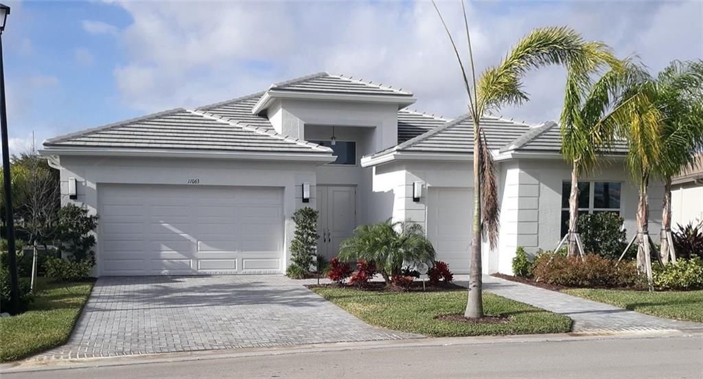 Photo of 11063 SW Ivory Springs Ln, Port Saint Lucie, FL 34987 (MLS # F10270457)