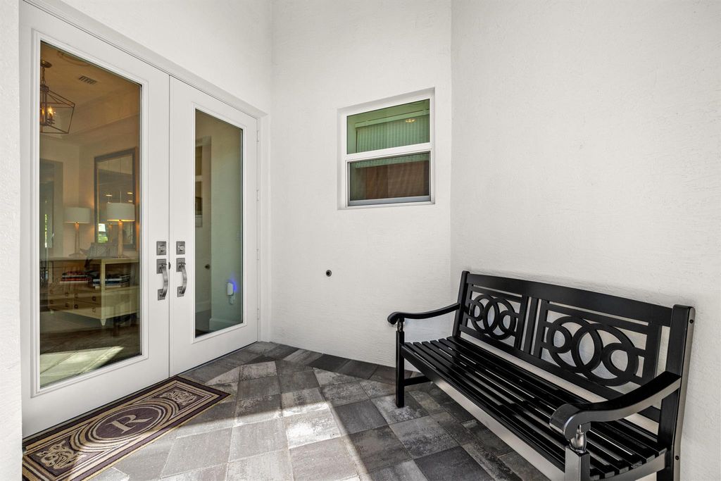 Photo of 11958 SW Coral Cove Parkway, Port Saint Lucie, FL 34987 (MLS # R10977079)